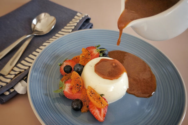Panna Cotta with berries and Speculaas spiced caramel sauce